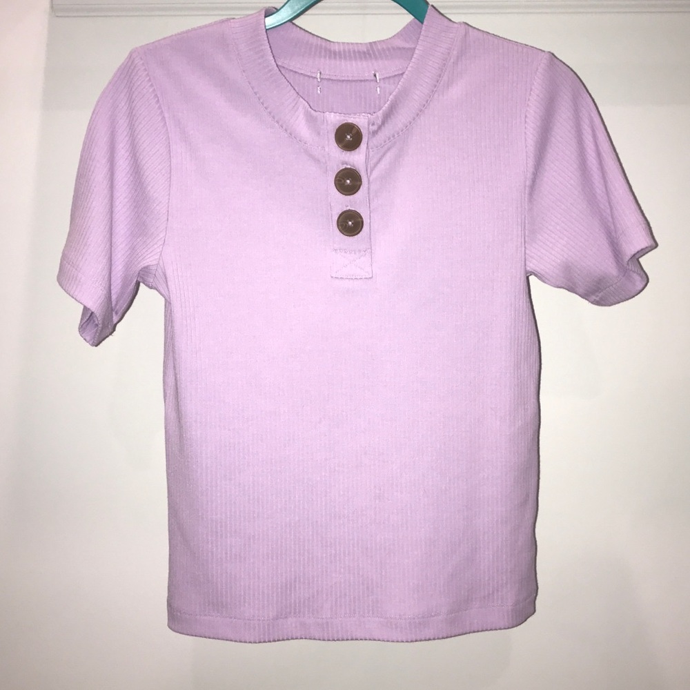 Pale purple shirt with oversized buttons